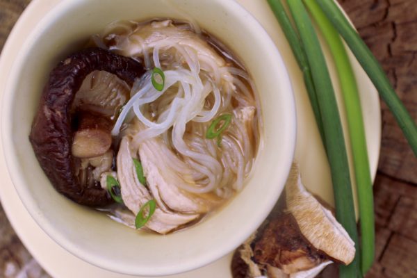 authentic chicken long rice with noddles, shiitake mushrooms, and green onion