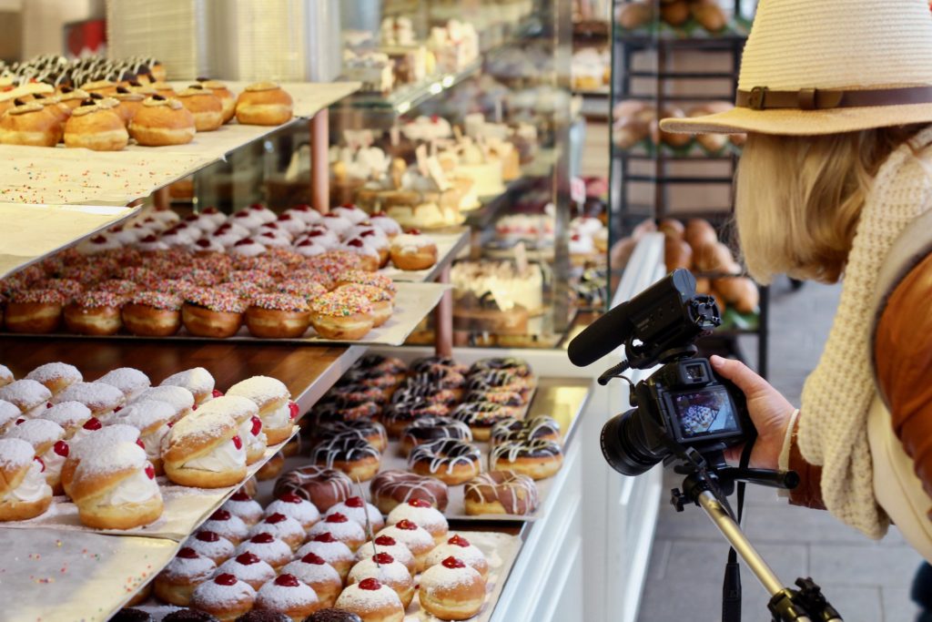 getting a shot of donuts 