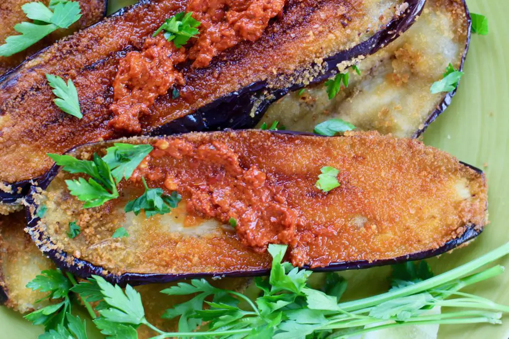 juicy harissa paste on eggplant slice 
