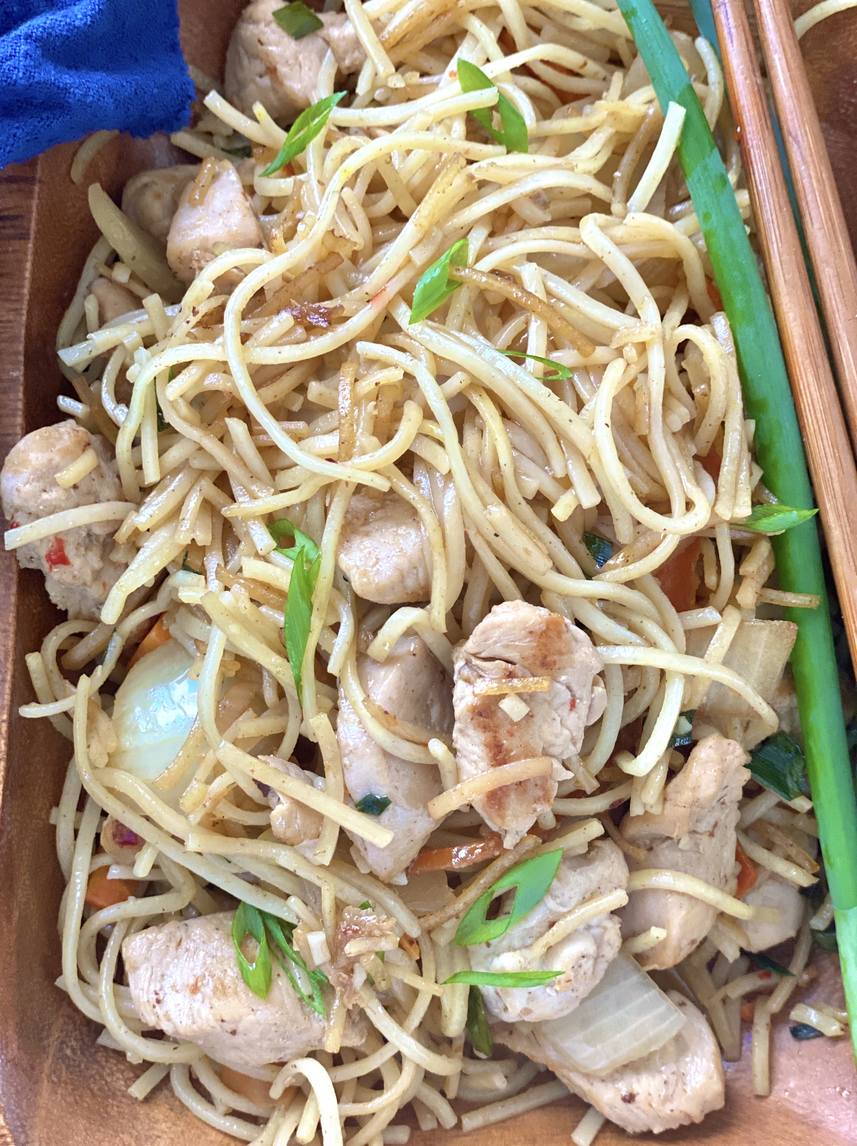 a big plate of chicken chow mein