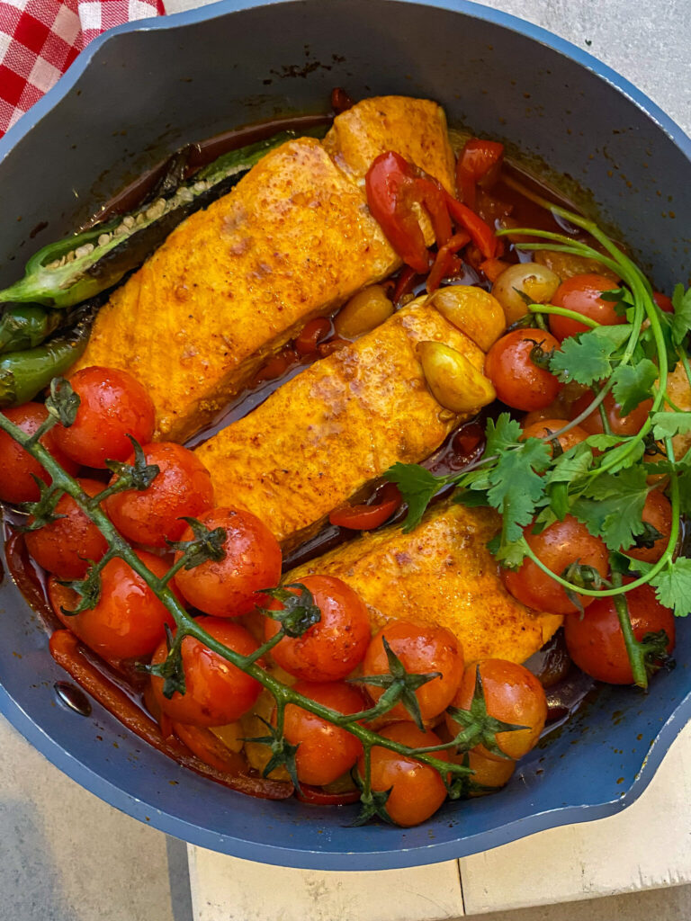 juicy salmon with burst cherry tomatoes 