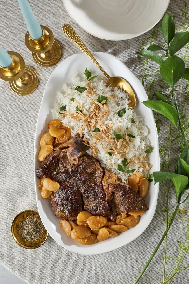 plate of asado with beans and rice