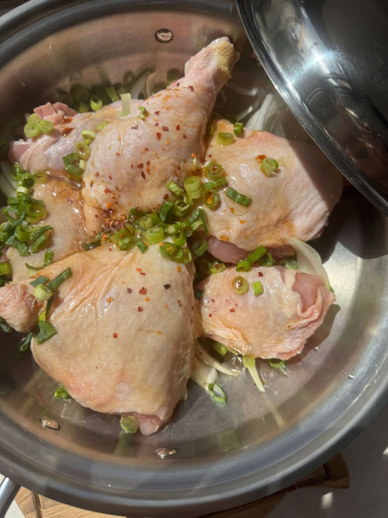 All ingredients in one pot ready to cook shoyu chicken