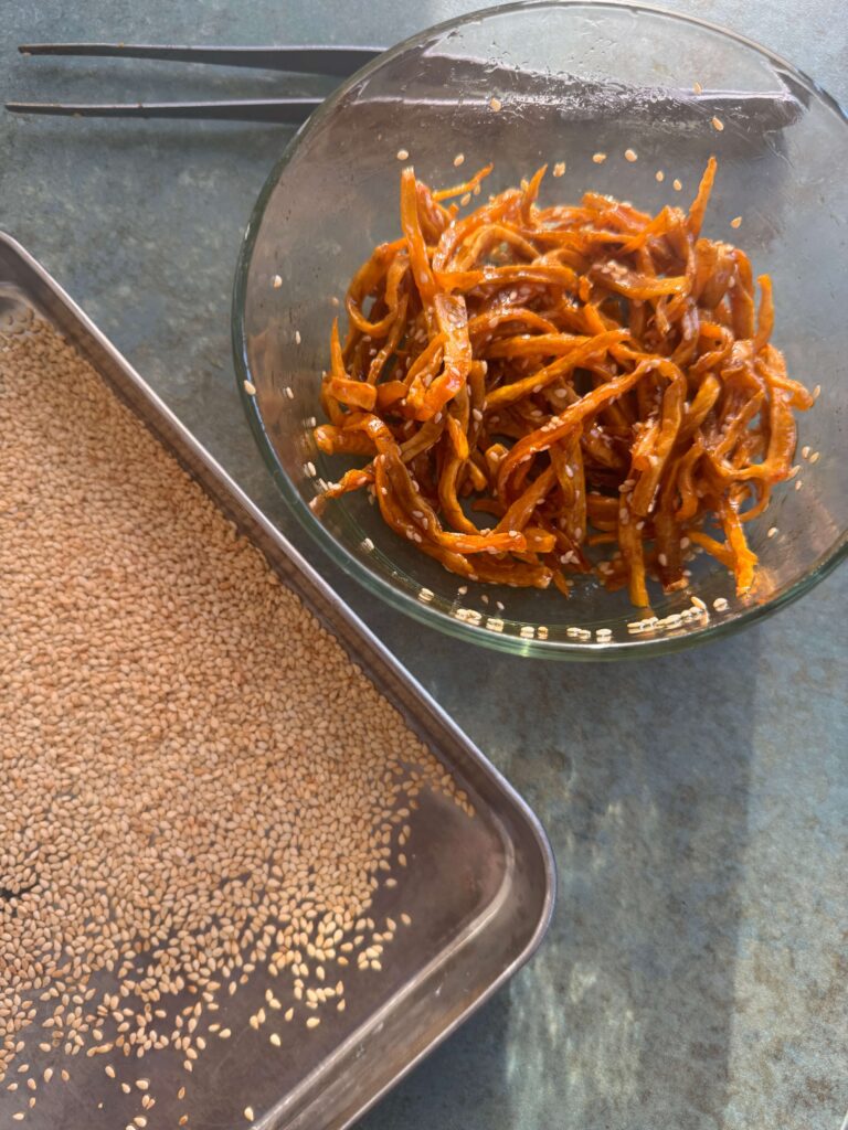 Fried sweet potato with sesame
